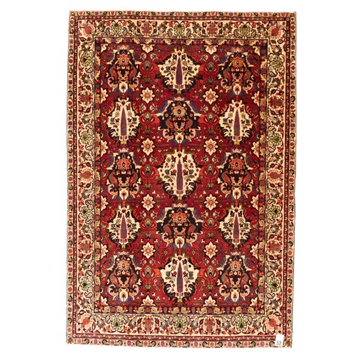 52 · A FINE PERSIAN BAKHTIAR CHAHALSHOTOR CARPET (307L X 210W CM)