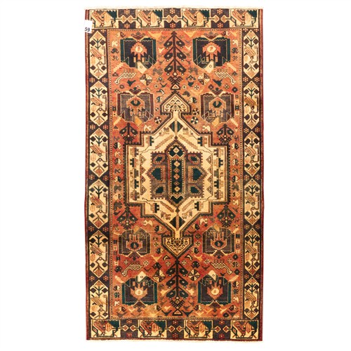 A HAND-KNOTTED NOMADIC SHAHSAVAN RUG (298L X 156W CM)