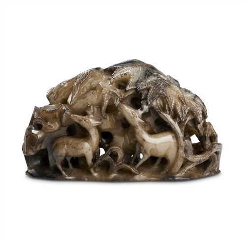 A Chinese Pale White And Dark Jade Boulder, Possibly Yuan Or Later