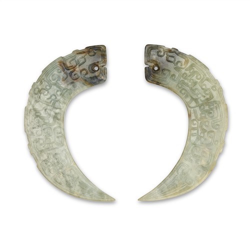 A Pair Of Chinese Celadon Jade 'Dragon' Pendants, Xi