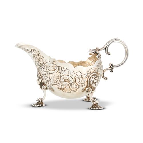 57 · AN IRISH EARLY GEORGE II–III STERLING SILVER SAUCE BOAT Probably James Warren (mark rubbed), Dublin, third quarter 18th century (dat...