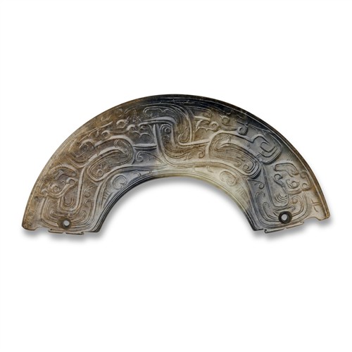 A Chinese Pale White And Dark Jade Huang