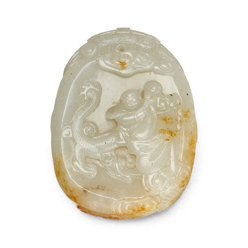 A Chinese White And Russet Jade Carved Pendant, Qing Dynasty (1644 - 1911)