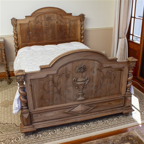 20 · AN ANTIQUE TIMBER BED FRAME