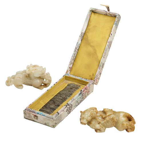 28 · A GROUP OF THREE ARCHAISTIC JADE CARVINGS