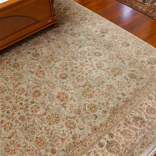 7 · A LARGE PAKISTANI RUG IN SAGE GREEN