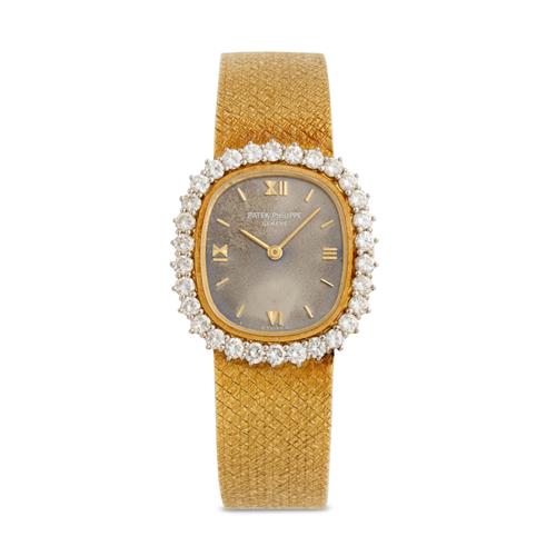 Patek Philippe Ref 4174 1 A Lady'S 18ct Gold And Diamond-Set Bracelet Watch With Sigma Dial Circa 1975