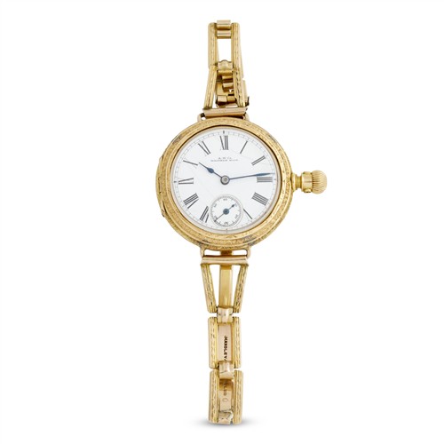 10 · A W CO WALTHAM AN 18CT GOLD POCKETWATCH CONVERTED TO WRISTWATCH CIRCA