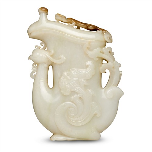 92 · A MAGNIFICENT CHINESE WHITE AND RUSSET ARCHAISTIC JADE 'PHOENIX' VESSEL AND COVER, GONG, QING DYNASTY (1644-1912)