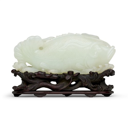A CHINESE WHITE JADE FISH CARVING, QING DYNASTY (1644-1912)
