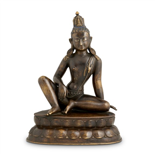 61 · A NEPALESE SILVER AND COPPER INLAY BRONZE SEATED FIGURE OF INDRA, 18TH CENTURY