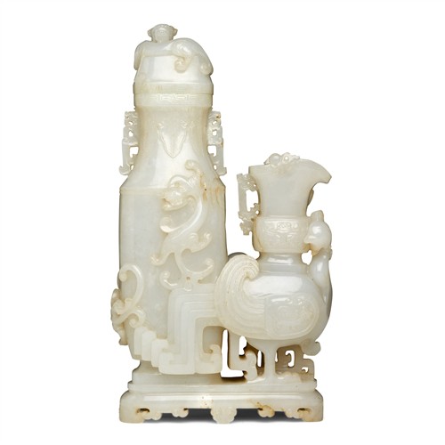 A FINE AND RARE CHINESE ARCHAISTIC WHITE JADE 'DRAGON AND PHOENIX' TWIN VASE GROUP AND COVER, QING DYNASTY (1644 - 1911)