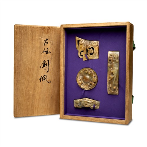 A Group Of Four Chinese Archaic Jade Sword Ornaments