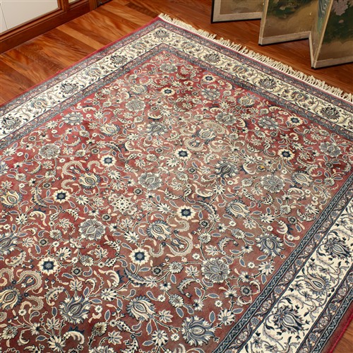 A LARGE TURKISH MADE RUG