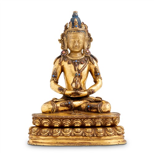 51 · A RARE TIBETAN GILT-BRONZE SEATED FIGURE OF BUDDHA AMITAYUS, POSSIBLY 15TH CENTURY