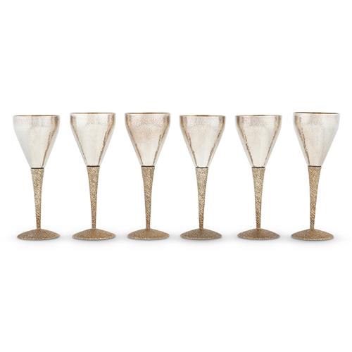 74 · A MATCHED SET OF SIX ELIZABETH II PARCEL-GILT STERLING WINE GOBLETS BY STUART DEVLIN London, 1970 (three) and 1975 (three)