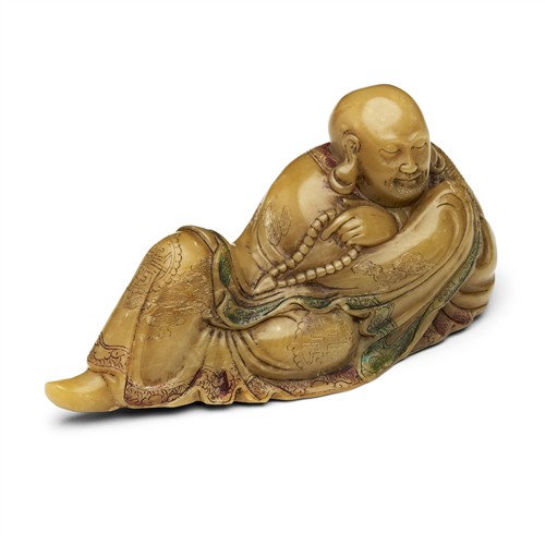 A Chinese Soapstone Carved Recumbent Figure Of Luohan, Qing Dynasty (1644 - 1911)