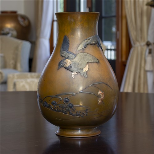 AN ORNATE BRONZE PEAR SHAPE VASE BY SAWADA YOSHIMITSU