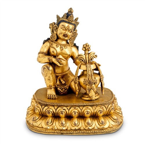 63 · A RARE TIBETAN GILT BRONZE KNEELING FIGURE OF JAMBHALA AND A VASE, 17TH/18TH CENTURY