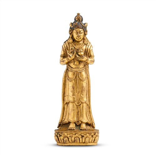 53 · A SINO-TIBETAN GILT-BRONZE STANDING FIGURE OF AN AVALOKITESHVARA, POSSIBLY 18TH CENTURY
