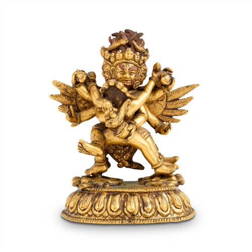 62 · A SMALL TIBETAN GILT BRONZE MAHAKALA, 19TH CENTURY
