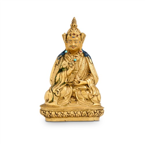 66 · A TIBETAN GILT-BRONZE SEATED FIGURE OF PADMASAMBHAVA, 18TH CENTURY