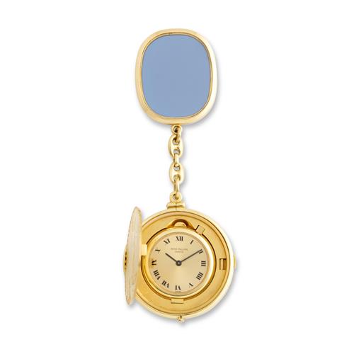 PATEK PHILIPPE REF 802 AN 18CT GOLD CONCEALED 20 DOLLAR LIBERTY COIN WATCH WITH ELLIPSE KEY CHAIN CIRCA 1974