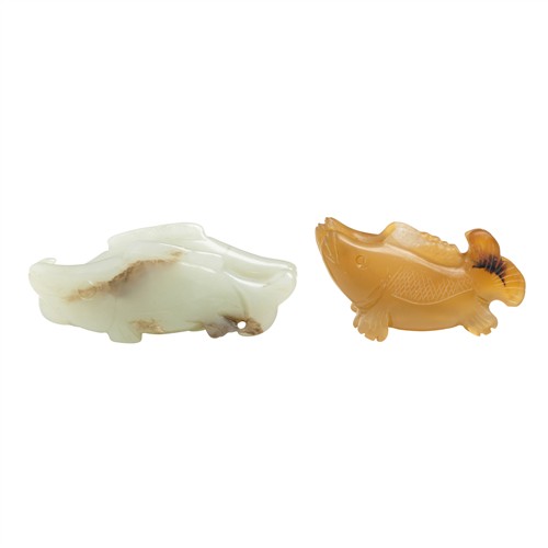 31 · TWO CHINESE CARVED DOUBLE FISH PENDANTS, QING DYNASTY (1644 - 1911) OR EARLIER