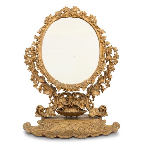 12 · AN ANTIQUE FRENCH GILT BRASS TOILET MIRROR Late 19th century Please see important information below regarding collection of lots in...