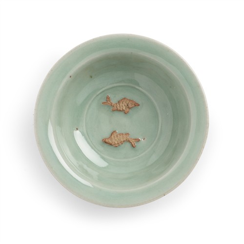 60 · A RARE CHINESE SMALL BISCUIT-RESERVED LONGQUAN CELADON `TWIN-FISH' DISH, POSSIBLY SOUTHERN SONG DYNASTY (1127-1279)