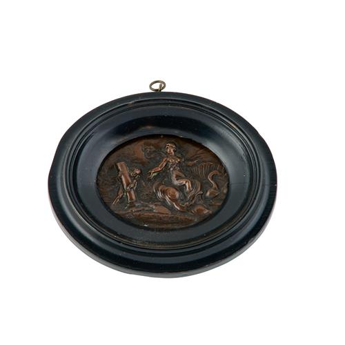 46 · AN ANTIQUE OVAL BRONZED PLAQUE OF JUNO AND CUPID