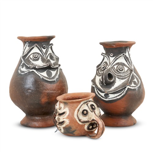 63 · TWO SIMILAR SEPIK RIVER DECORATED EARTHENWARE SAGO POTS, AND ANOTHER SMALLER VESSEL OF SIMILAR CHARACTER Please see important inform...
